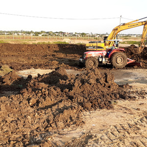 Grow-out pond under construction