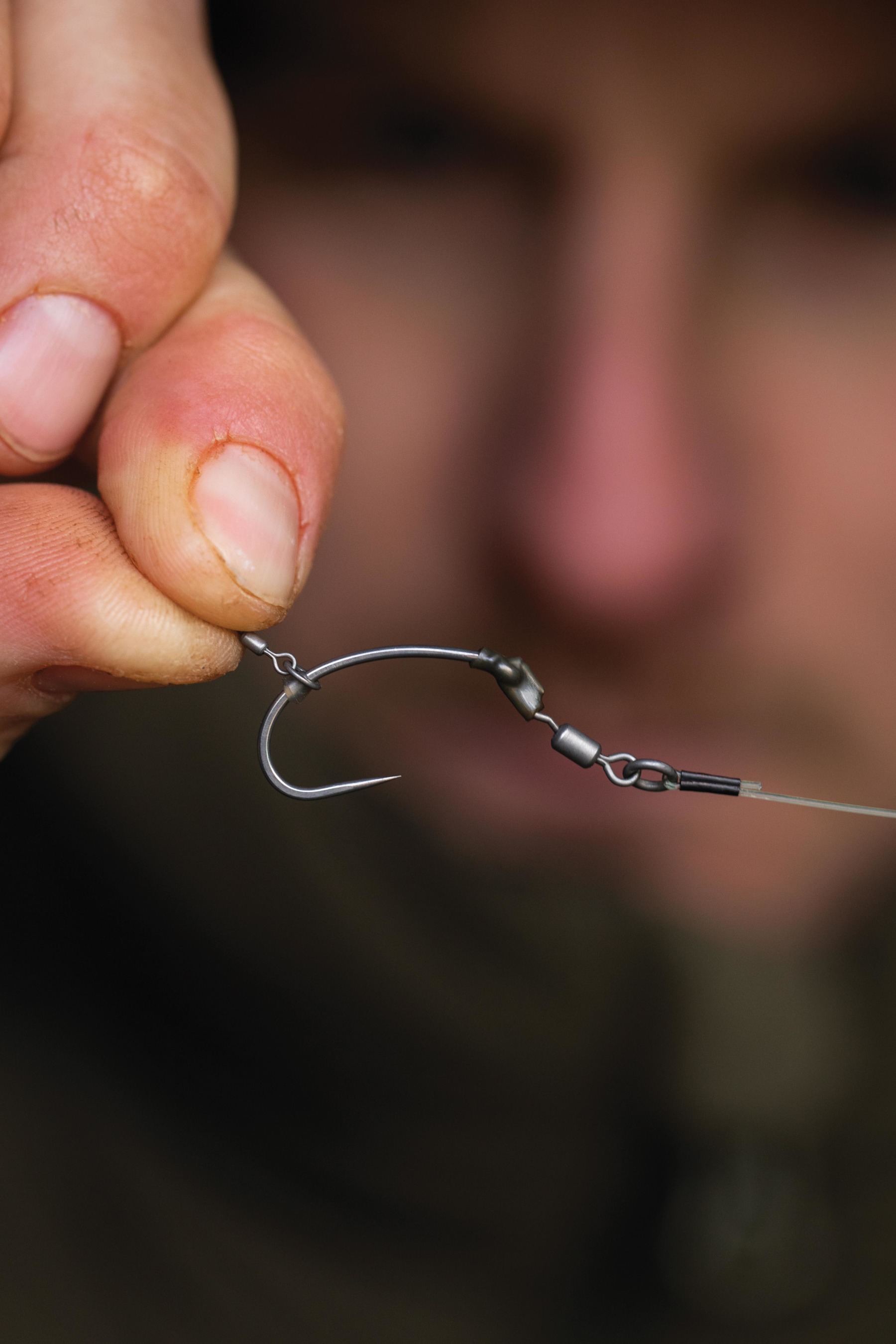 4. Add a hookbait swivel to the shank and position a hook bead opposite the barb.