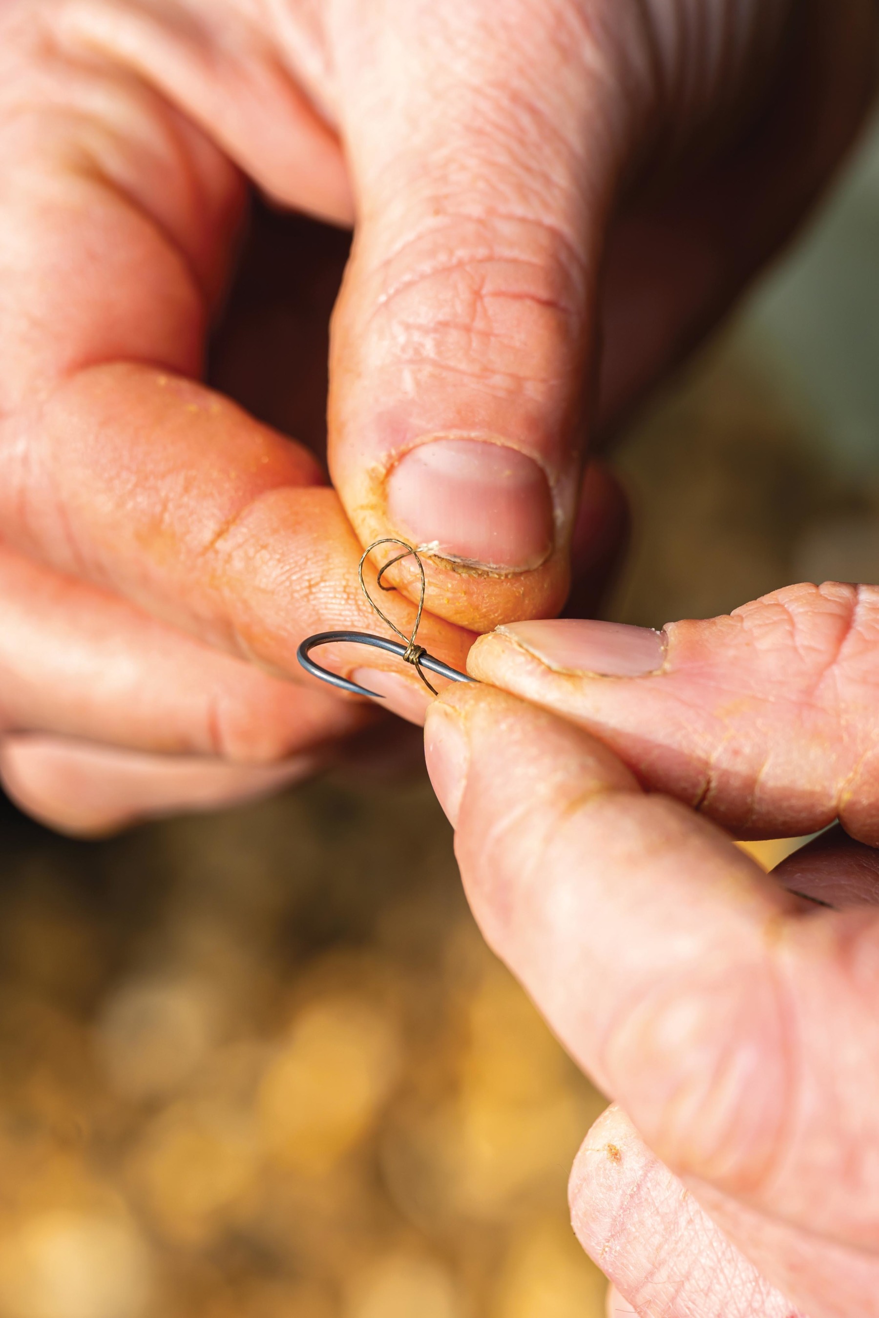 Pass the braid through the small loop that you formed.